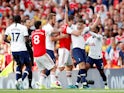 Tottenham Hotspur's Harry Winks and Arsenal's Sokratis Papastathopoulos clash on September 1, 2019