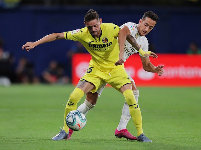 Villarreal's Xavier Quintilla in action with Real Madrid's Lucas Vazquez in La Liga on September 1, 2019