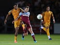 Newport County's Tristan Abrahams in action with West Ham United's Jack Wilshere on August 27, 2019