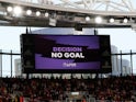 The big screen displays a VAR review message ruling out an Arsenal goal on September 1, 2019