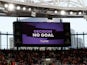 The big screen displays a VAR review message ruling out an Arsenal goal on September 1, 2019