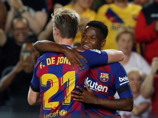 Barcelona's Frenkie de Jong celebrates scoring their second goal with Anssumane Fati on September 14, 2019