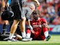 Divock Origi goes down injured during the Premier League game between Liverpool and Newcastle United on September 14, 2019