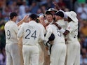 Joe Root celebrates with teammates after taking a catch to dismiss Australia's Josh Hazlewood to give England victory in the fifth test on September 15, 2019