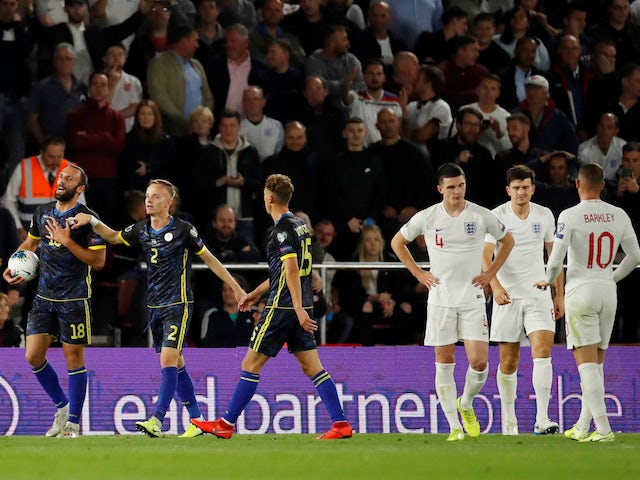 Kosovo's Vedat Muriqi reacts after being awarded a penalty due to being fouled by England's Harry Maguire on September 10, 2019
