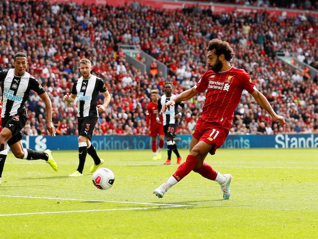 Mohamed Salah scores the third during the Premier League game between Liverpool and Newcastle United on September 14, 2019