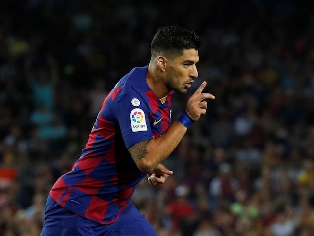 Barcelona's Luis Suarez celebrates scoring their fourth goal against Valencia on September 14, 2019