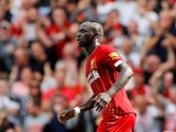 Sadio Mane celebrates scoring during the Premier League game between Liverpool and Newcastle United on September 14, 2019