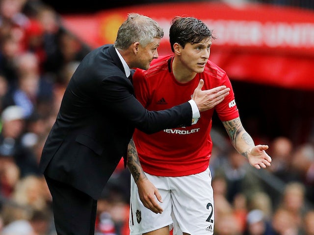 Manchester United's Victor Lindelof pictured with Ole Gunnar Solskjaer in August 2019