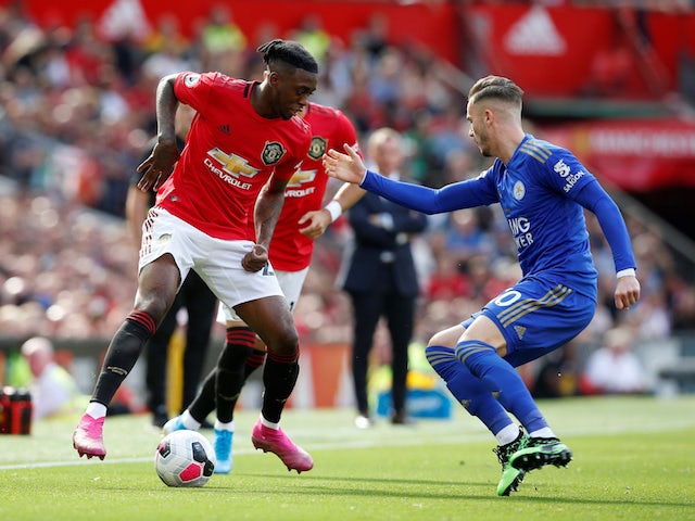 Manchester United's Aaron Wan-Bissaka in action with Leicester City's James Maddison in the Premier League on September 14, 2019