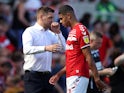 Middlesbrough's manager Jonathan Woodgate talks to Ashley Fletcher before the match in August 2019
