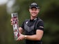 England's Danny Willett poses with award after winning the BMW PGA Championship on September 22, 2019
