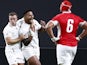 England's Manu Tuilagi celebrates with team mate scoring their second try against Tonga on September 22, 2019