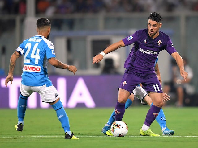 Fiorentina's Riccardo Sottil in action with Napoli's Lorenzo Insigne in Serie A on August 24, 2019