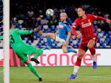 Napoli's Dries Mertens in action with Liverpool's Virgil van Dijk and Adrian on September 17, 2019