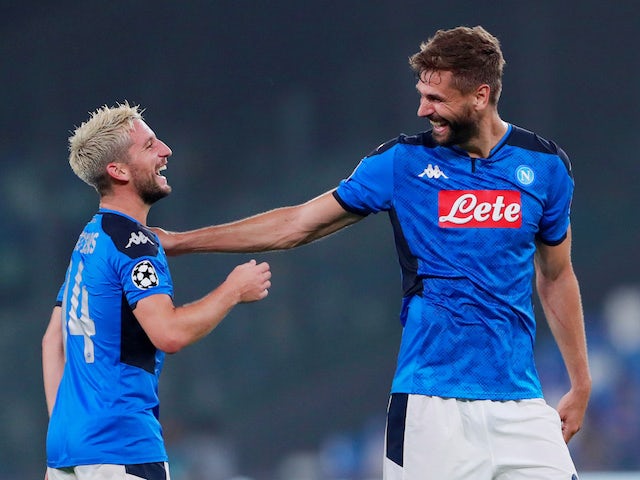 Napoli's Fernando Llorente and Dries Mertens celebrate after the match on September 17, 2019