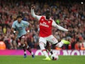 Arsenal's Nicolas Pepe scores their first goal from the penalty spot against Aston Villa on September 22, 2019