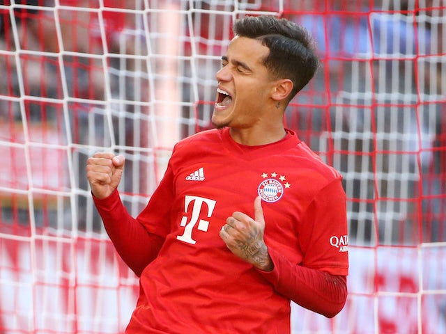 Bayern Munich's Philippe Coutinho celebrates scoring their third goal against Koln on September 21, 2019