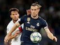 Real Madrid's Gareth Bale battles Paris Saint-Germain's Juan Bernat during their Champions League clash on September 18, 2019