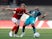 Andre Ayew and Nathan Baker in action on September 21, 2019