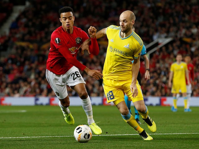 Manchester United's Mason Greenwood in action with Astana's Ivan Maevski in the Europa League on September 19, 2019