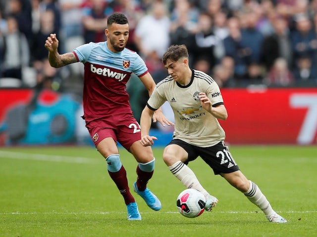 Manchester United's Daniel James in action with West Ham United's Ryan Fredericks in the Premier League on September 22, 2019