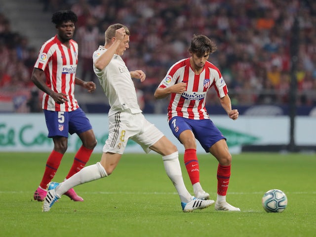 Real Madrid's Toni Kroos in action with Atletico Madrid's Joao Felix in La Liga on September 28, 2019