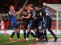 Nottingham Forest's Lewis Grabban celebrates with team mates after scoring their third goal against Stoke on September 27, 2019