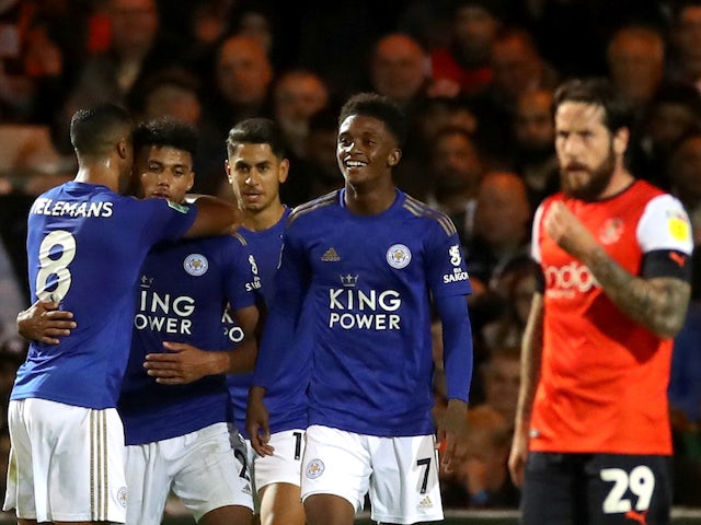 Leicester City's James Justin celebrates scoring their second goal with teammates against Luton on September 24, 2019