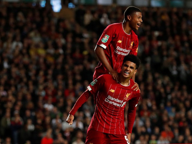 Liverpool's Ki-Jana Hoever celebrates scoring their second goal with Rhian Brewster on September 25, 2019