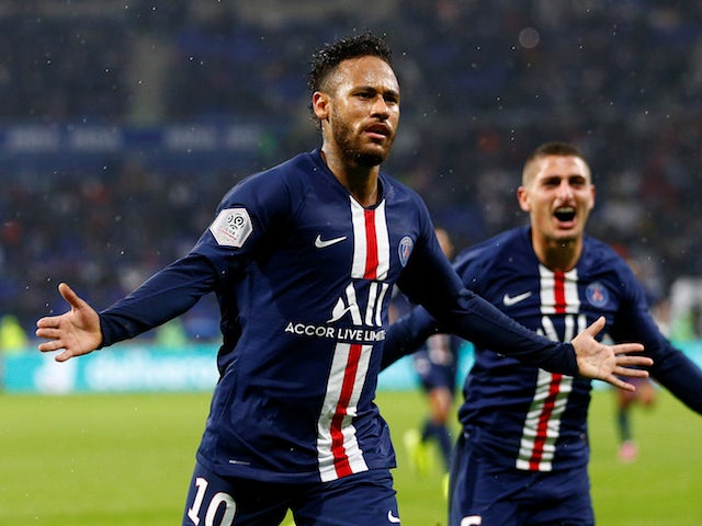 Paris Saint-Germain's Neymar celebrates scoring their first goal against Lyon on September 22, 2019
