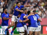 Samoa players celebrate their third try scored by Ed Fidow on September 24, 2019