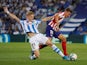 Real Sociedad's Martin Odegaard in action with Atletico Madrid's Marcos Llorente in La Liga on September 14, 2019
