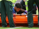Everton's Theo Walcott is stretchered off on September 28, 2019