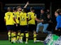 Oxford United's Matty Taylor celebrates scoring their second goal against West Ham with teammates and fans on September 25, 2019