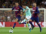 Barcelona's Sergio Busquets in action with Inter Milan's Stefano Sensi in the Champions League on October 2, 2019