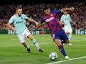 Barcelona's Luis Suarez in action with Inter Milan's Stefan de Vrij in the Champions League on October 2, 2019