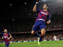 Barcelona's Luis Suarez celebrates scoring their first goal against Sevilla on October 6, 2019