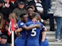 Chelsea's Tammy Abraham celebrates scoring their first goal with Callum Hudson-Odoi and team mates on October 6, 2019