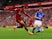 Liverpool's Trent Alexander-Arnold in action with Leicester City's Caglar Soyuncu