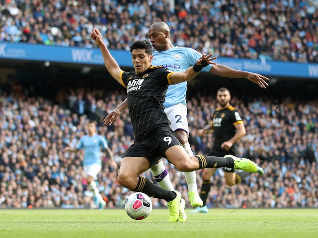 Raul Jimenez and Fernandinho in action during the Premier League game between Manchester City and Wolverhampton Wanderers on October 6, 2019
