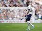 Tottenham Hotspur's Serge Aurier looks dejected as he walks off after being shown a red card on September 28, 2019