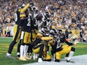 The Pittsburgh Steelers defense celebrates an interception in the end-zone by inside linebacker Mark Barron (26) against the Cincinnati Bengals during the fourth quarter at Heinz Field on October 1, 2019