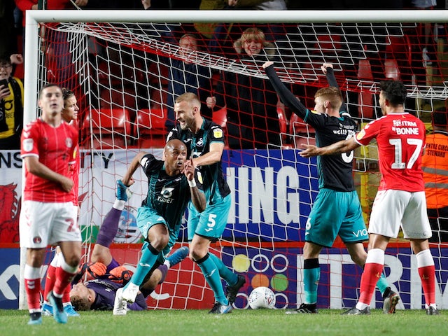 Swansea move top with comeback win over Charlton