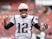 New England Patriots quarterback Tom Brady (12) gestures while running not the field for warmups prior to the Patriots game against the Washington Redskins at FedExField on October 6, 2019