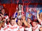 St Helens players lift the trophy as they celebrate their win against Salford Red Devils on October 12, 2019