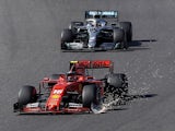 Ferrari's Charles Leclerc with a damaged front wing and Mercedes' Lewis Hamilton in action during the race