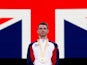 Gold medalist Britain's Max Whitlock celebrates on the podium on October 12, 2019