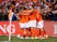 Netherlands' Memphis Depay celebrates scoring their third goal with teammates