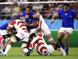 Samoa's Jack Lam in action with Japan's Pieter Labuschagne and Kazuki Himeno on October 5, 2019
